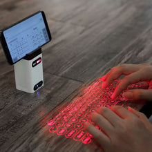Load image into Gallery viewer, Bluetooth virtual laser keyboard Wireless Projection mini keyboard Portable for computer Phone pad Laptop With Mouse function
